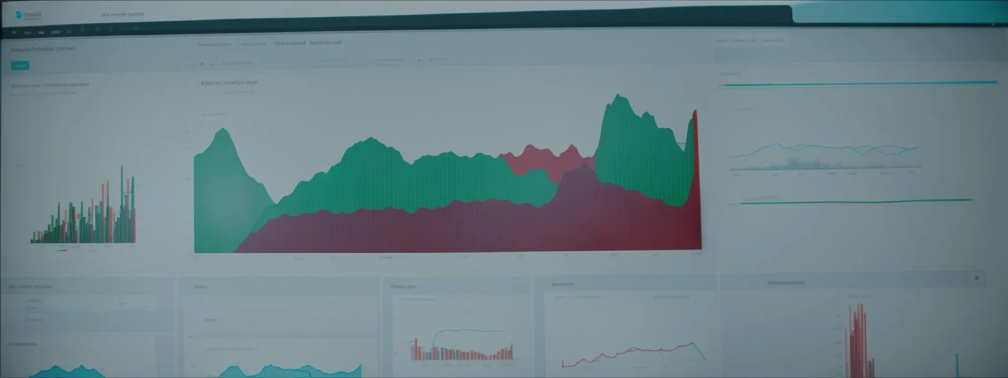 a person views an analytics dashboard on a computer screen showing trending curves and keyword performance indicators.