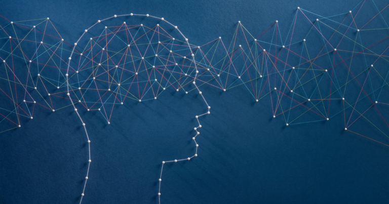 Silhouette of a human head on a blue background with multicolored interconnected threads, symbolizing network or thought connections—a vivid representation of how semantic SEO weaves through our minds for higher rankings.